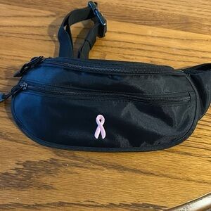 Women’s Black Fanny Pack with The Breast Cancer Logo in  Pink